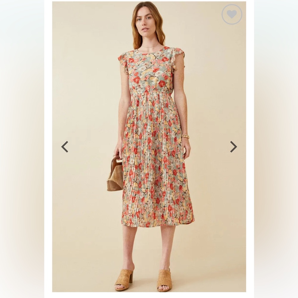 Floral dress with flutter sleeve and pleated skirt